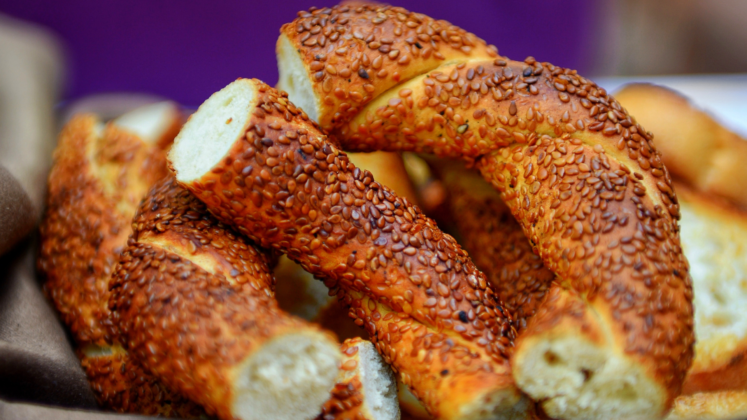 Simit, often referred to as the Turkish bagel, is a circular bread encrusted with sesame seeds. Crispy on the outside and soft on the inside, it’s a perfect snack for any time of the day. Pair it with a cup of Turkish tea for a classic Istanbul experience.