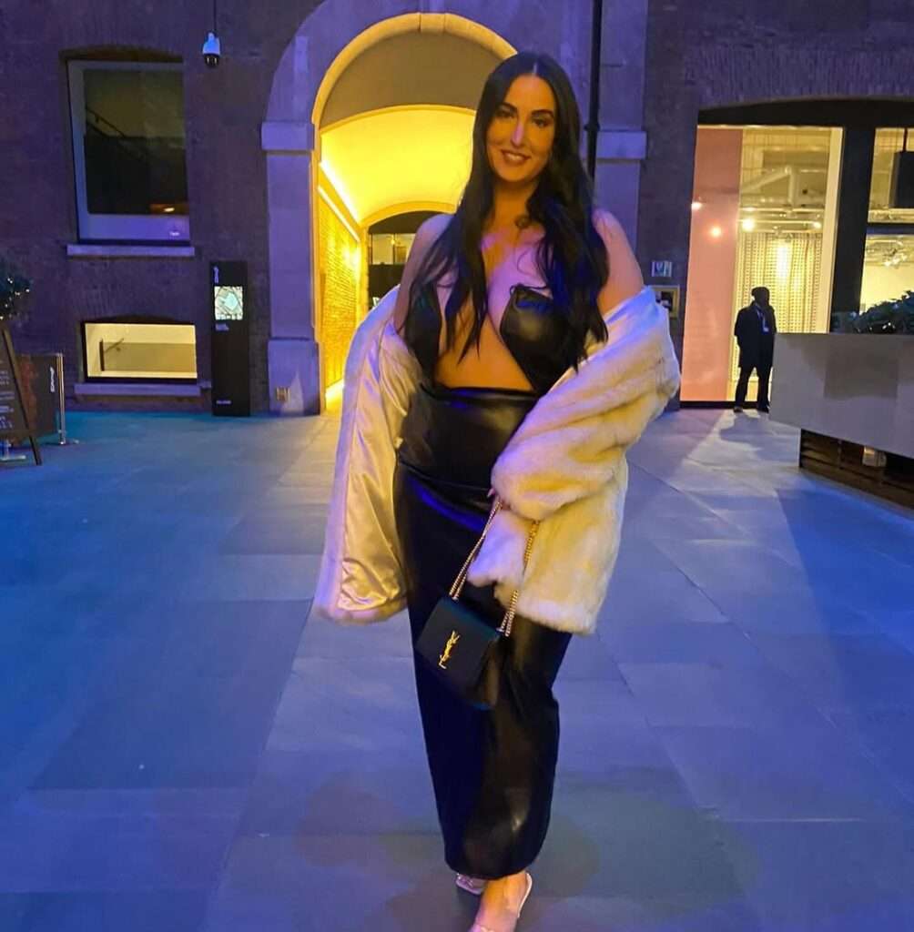 3. Black Leather Matching Set & White Fur Coat