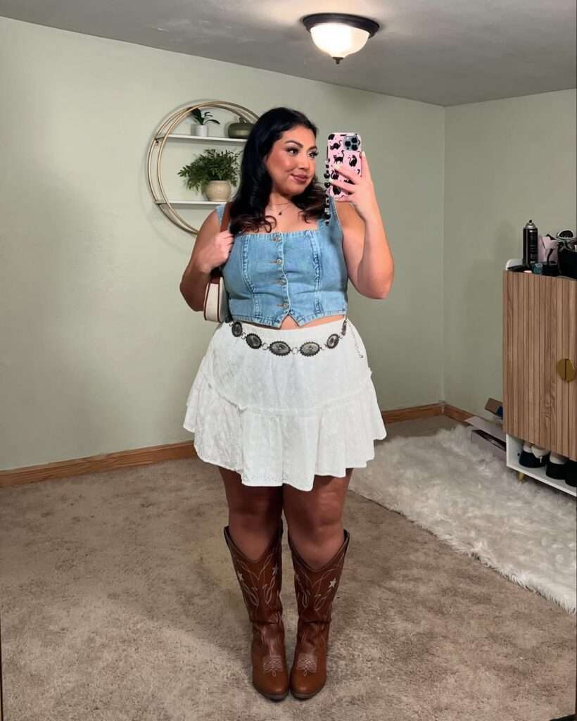 8. Denim Vest, White Mini Skirt, and Cowboy Boots