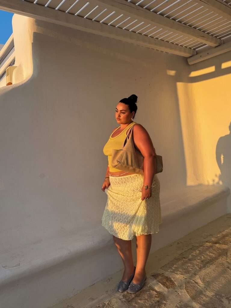 12. Yellow Tank With a Textured White Midi Skirt