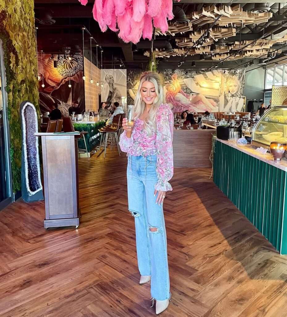 Pink Floral Blouse With Light-Wash Jeans
