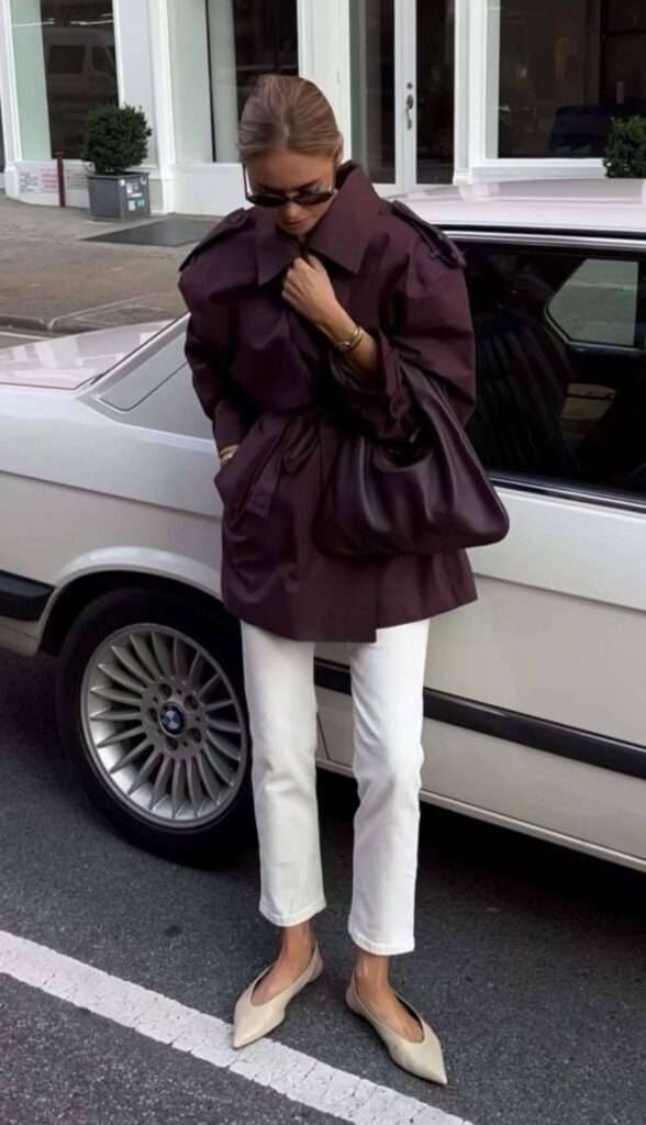 2. Deep Plum Trench + White Straight-Leg Jeans